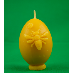 Egg-shaped candle with bee